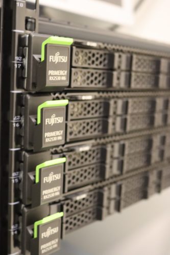 Four aggressive servers with Fujitsu logos.